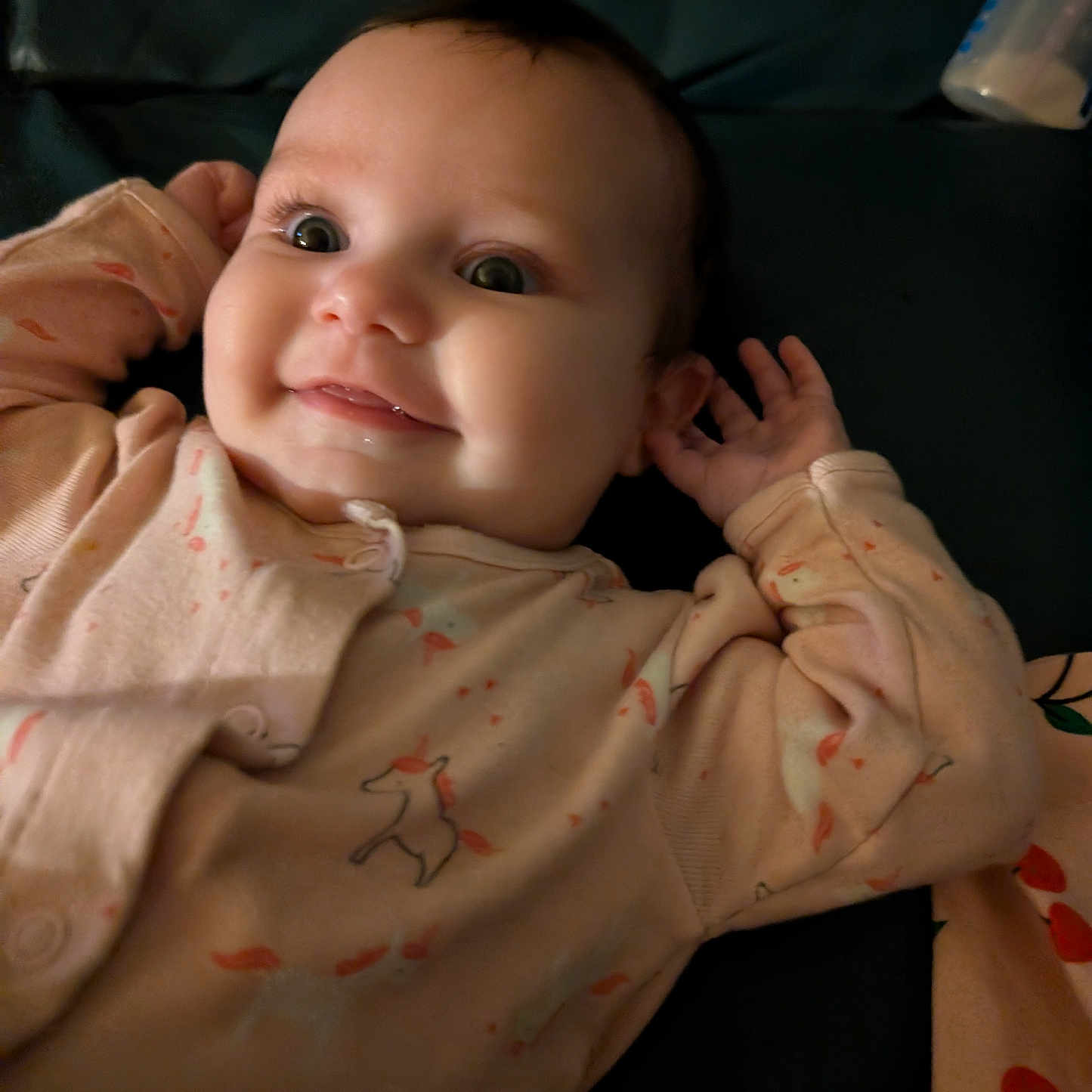 Riley Harper is registered to the contest to win money with this photo: baby, blanket, bodypart, clothing, couch, crib, face, finger, furniture, hand, happy, head, infantbed, longsleeve, newborn, person, photography, portrait, sleeve, smile