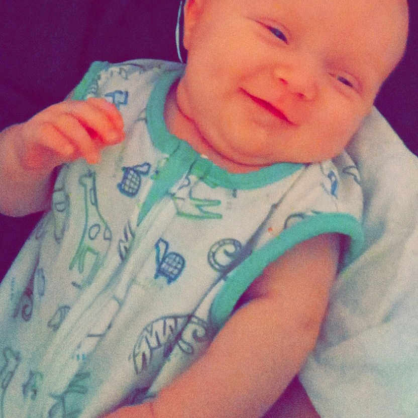 Zayvier is registered to the contest to win money with this photo: accessories, baby, blanket, bodypart, clothing, earring, face, finger, hand, happy, head, homedecor, jewelry, newborn, person, photography, portrait, quilt, smile, t_shirt