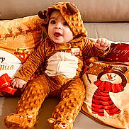 Noah joined the competition — help win amazing prizes! baby, child, reindeer_costume, christmas, holiday, festive, pillow, snowman, reindeer, couch, smiling, cute, indoors, celebration, happy, soft_toys, costume, seasonal, warm, cozy