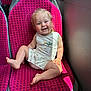 Karol participe au concours pour gagner de l'argent avec cette photo : baby, child, smiling, sitting, bus_seat, pink_seat, sunlight, indoor, clothing, happy, face, person, cute, infant, seat, window, daylight, casual, toddler, transport