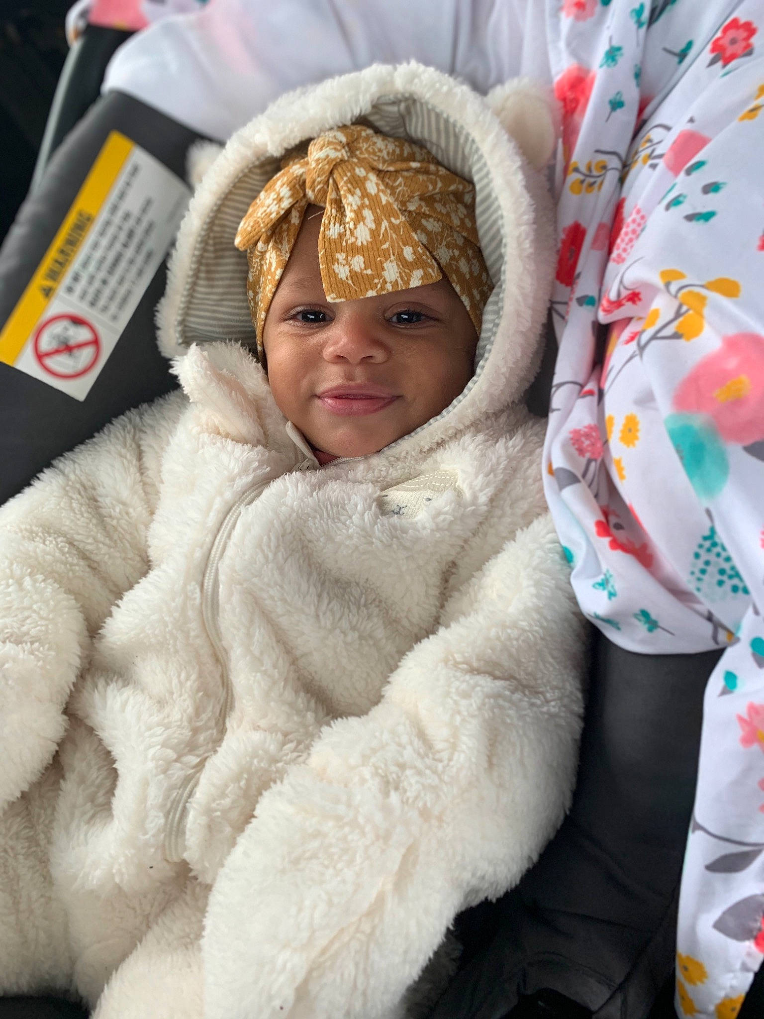 Mahogany is registered to the contest to win money with this photo: baby, baby_products, baby_safety, baby_sleeping, baby_toddler_clothing, cheek, child, comfort, fun, fur, fur_clothing, happy, headwear, hood, linens, pattern, person, polar_fleece, sleeve, textile