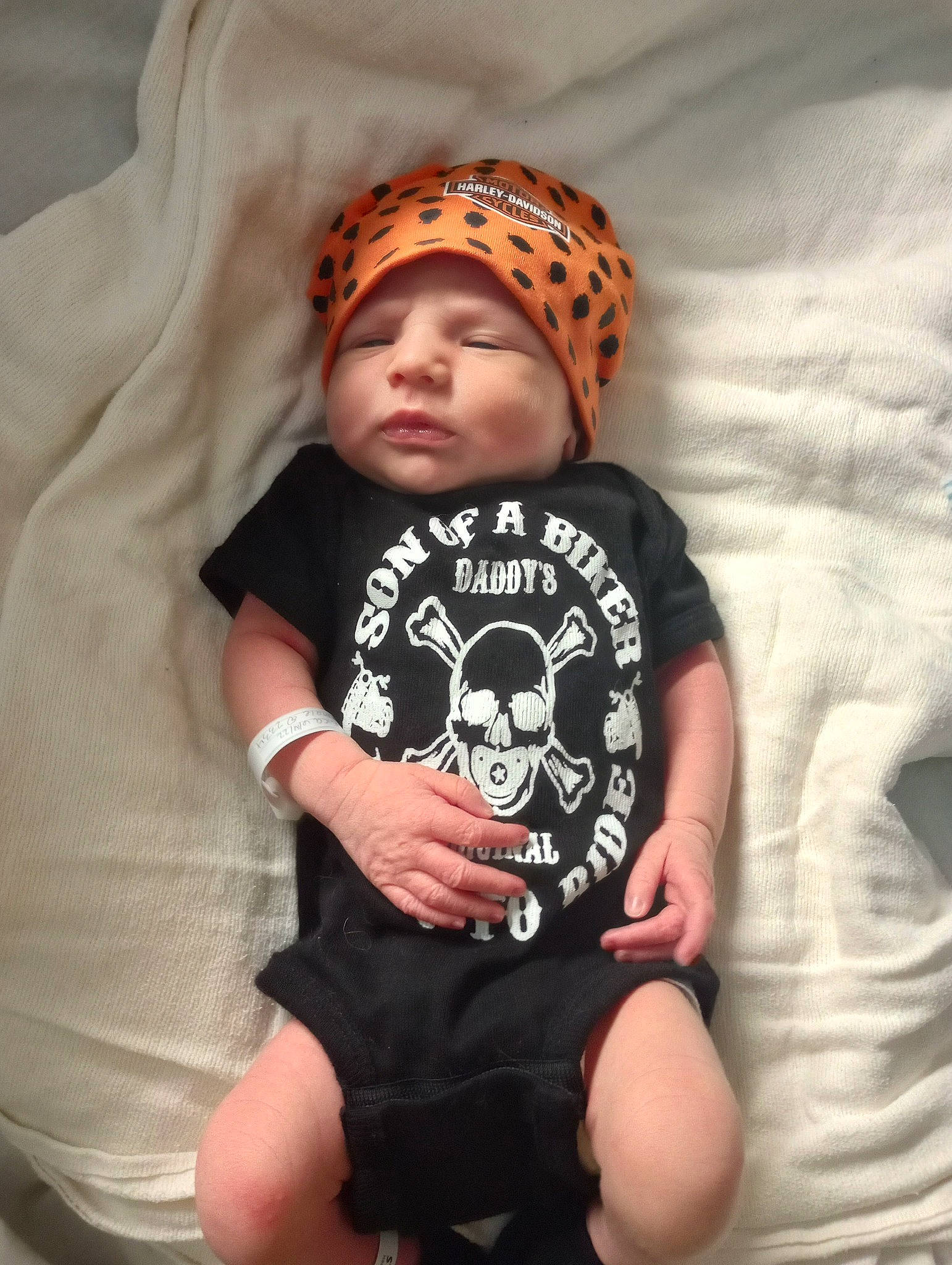 Julien joined the competition — help win amazing prizes! baby, baby_toddler_clothing, cap, child, comfort, eye, finger, flash_photography, happy, headgear, headwear, human_leg, knee, pattern, person, pink, sitting, skin, sleeve, t_shirt