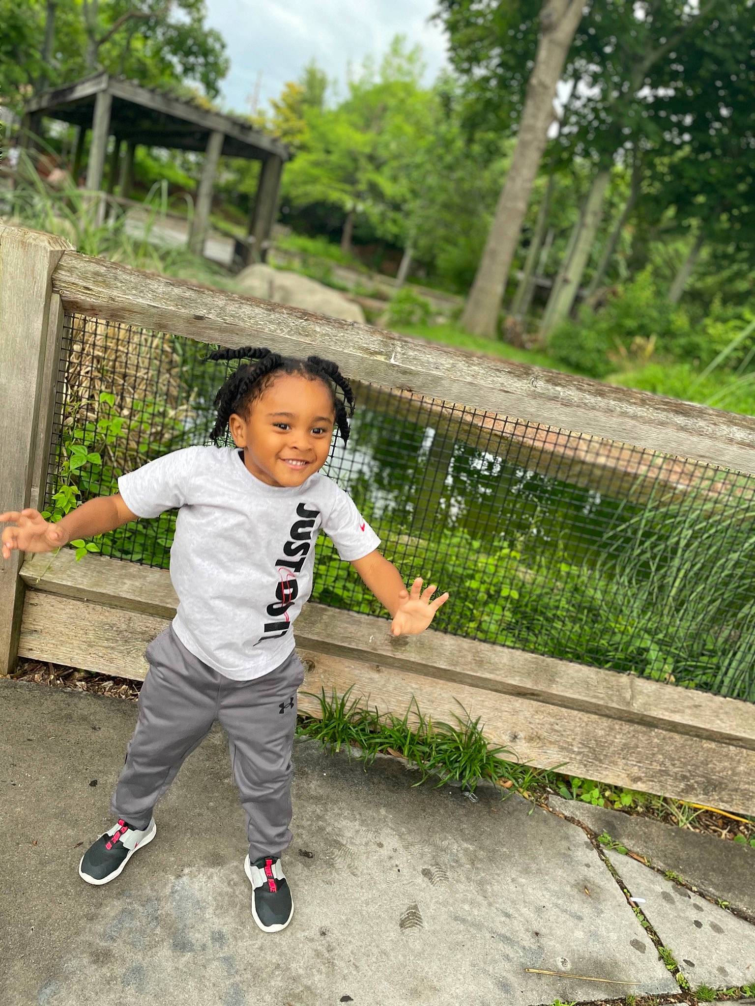 Jordyn is registered to the contest to win money with this photo: child, forest, fun, garden, grass, happy, joy, landscape, leisure, people_in_nature, person, plant, recreation, road, sitting, soil, toddler, tourism, tree, walking