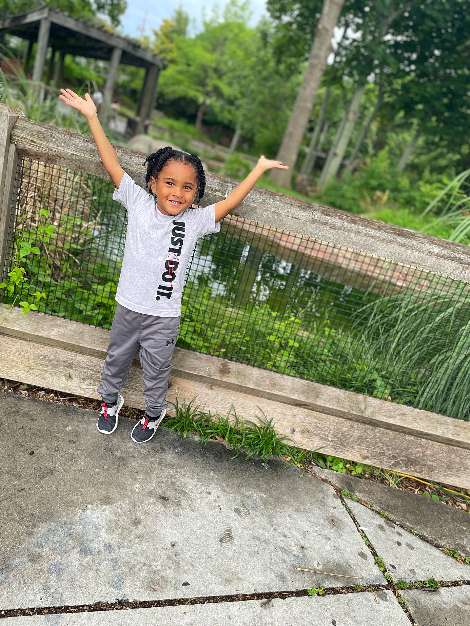 Jordyn is registered to the contest to win money with this photo: child, city, fun, garden, grass, happy, joy, landscape, leisure, pedestrian, people_in_nature, person, plant, play, recreation, road, sky, t_shirt, toddler, tourism