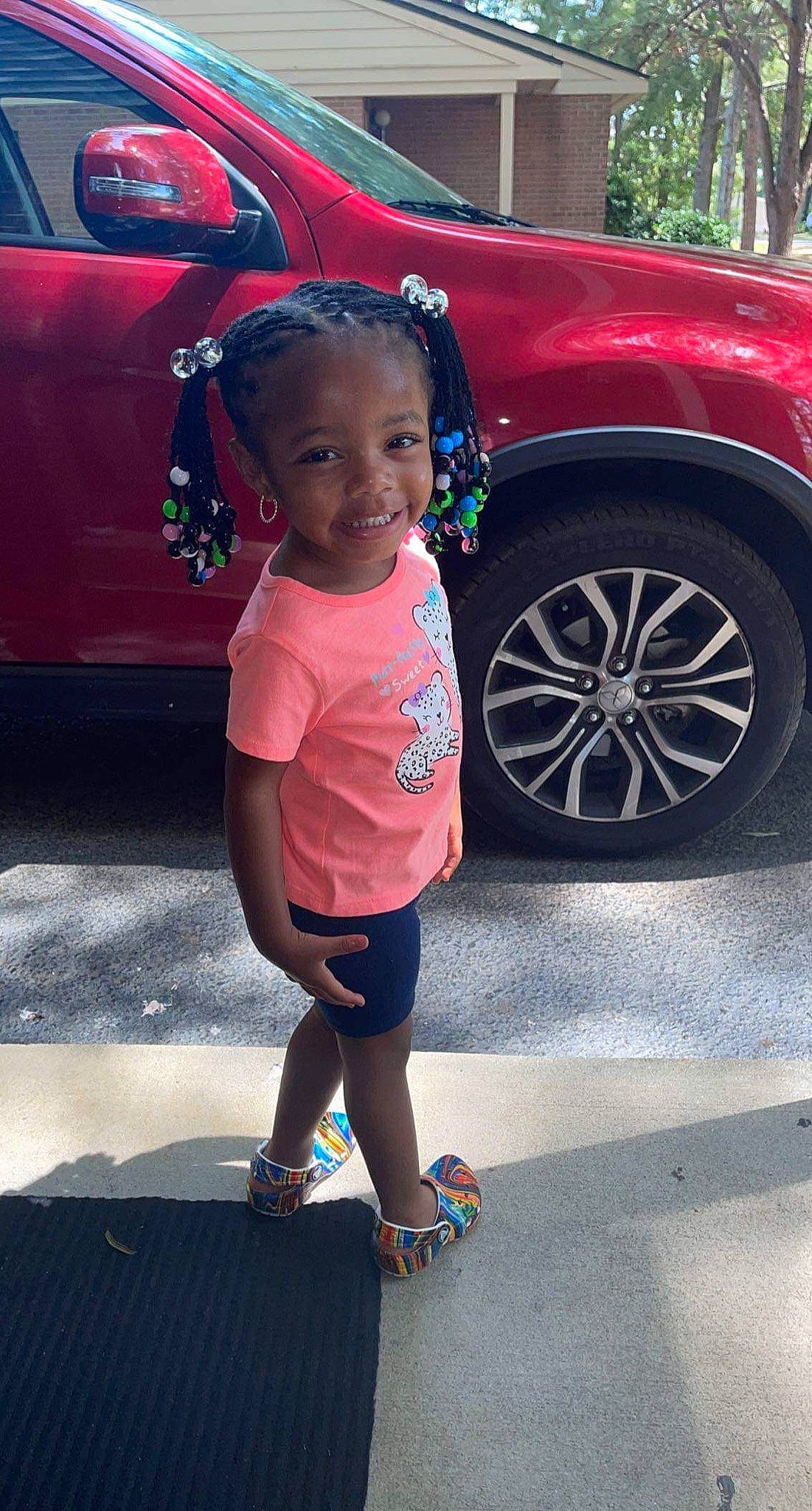 Dior joined the competition — help win amazing prizes! alloy_wheel, asphalt, automotive_design, automotive_exterior, automotive_lighting, automotive_tire, bumper, car, footwear, hood, joy, land_vehicle, light, motor_vehicle, person, pink, shoe, smile, tire, vehicle