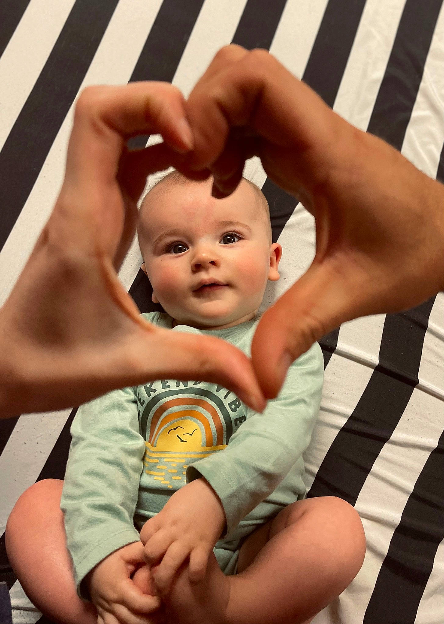 Timothy is registered to the contest to win money with this photo: abdomen, arm, baby, baby_toddler_clothing, cheek, comfort, facial_expression, finger, flash_photography, gesture, hand, happy, muscle, organ, people, person, photograph, skin, snapshot, thumb