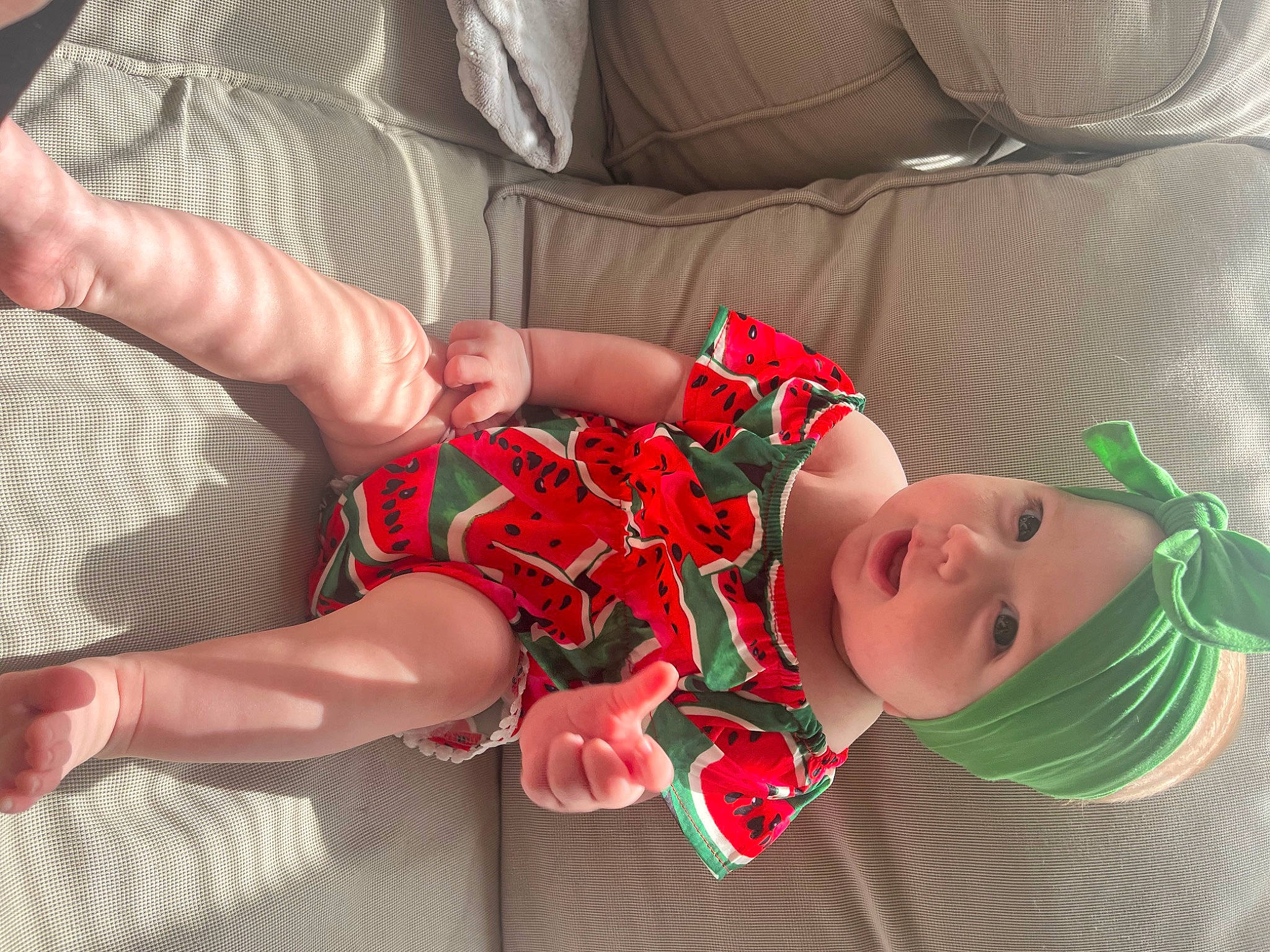 Sunny joined the competition — help win amazing prizes! baby, baby_toddler_clothing, carmine, child, comfort, dress, happy, headwear, human_leg, joint, lap, leg, pattern, person, plaid, plant, sleeve, sock, textile, thigh