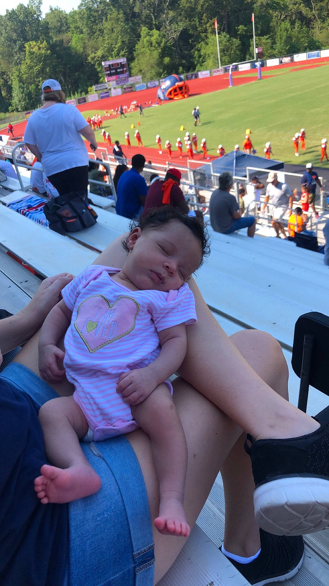 Aubreigh joined the competition — help win amazing prizes! crowd, fun, lap, leg, leisure, person, sitting, vacation