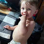 Xayne is registered to the contest to win money with this photo: toddler, child, baby, portrait, smiling, indoor, curious, skin, hand, face, eyes, hair, clothing, blanket, bed, person, cute, playful, expression, young