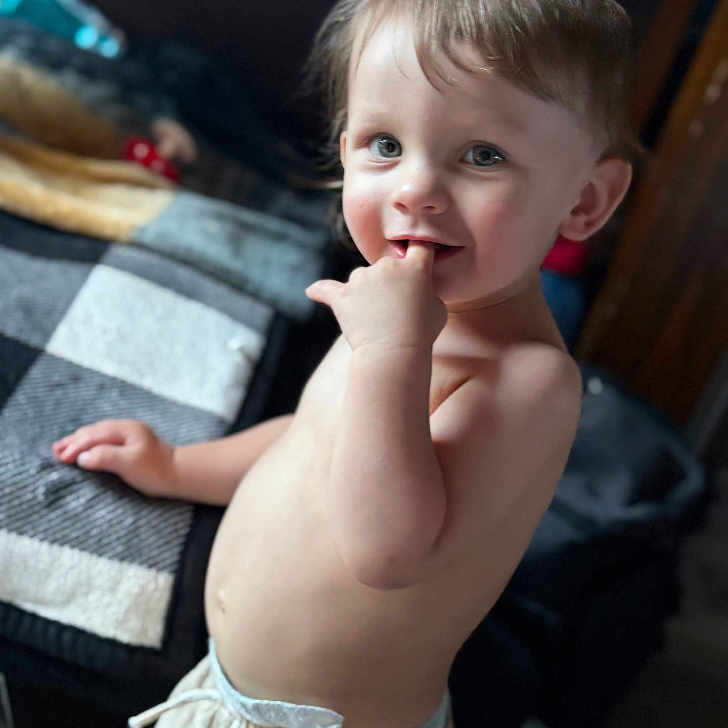 Xayne is registered to the contest to win money with this photo: toddler, child, baby, portrait, smiling, indoor, curious, skin, hand, face, eyes, hair, clothing, blanket, bed, person, cute, playful, expression, young