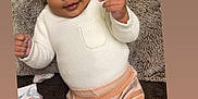 Zaryus joined the competition — help win amazing prizes! baby, infant, headband, white_sweater, striped_pants, smiling, blanket, baby_brush, baby_wipes, soft_texture, cute, cozy, indoor, child, person, portrait, happy, small_hands, lying_down, warm_clothing