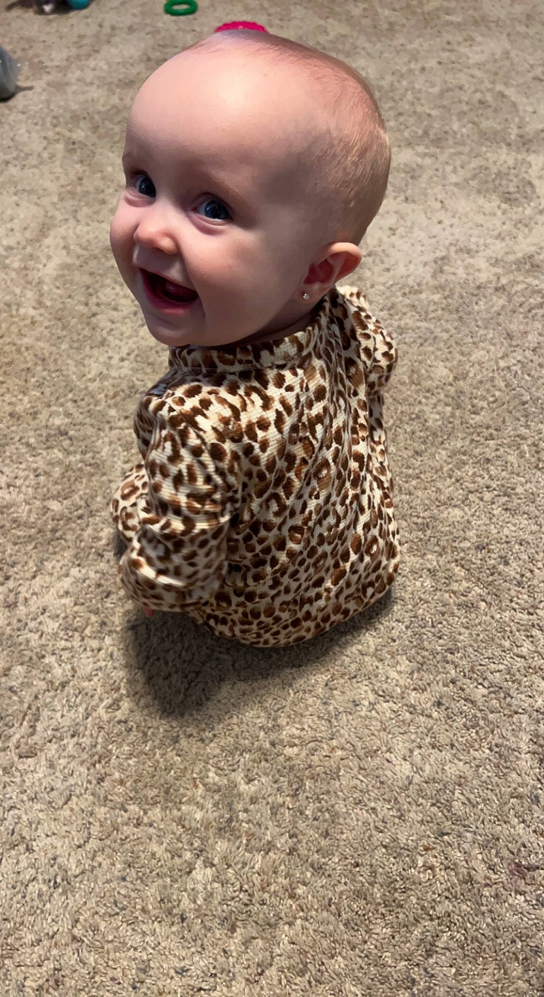Addison is registered to the contest to win money with this photo: asphalt, baby, baby_toddler_clothing, child, crawling, face, floor, flooring, fun, grass, happy, metal, pattern, person, road_surface, sleeve, smile, snapshot, soil, toddler