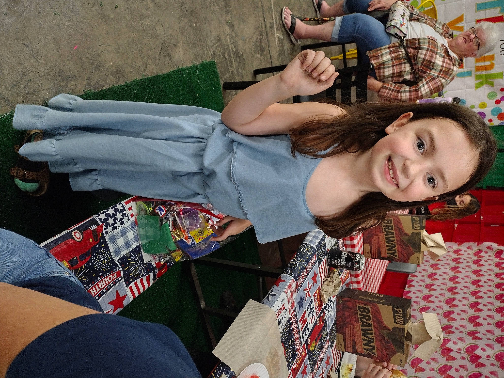 Autumn is registered to the contest to win money with this photo: clothing, cool, event, fun, happy, human_leg, joint, joy, knee, lap, leisure, pattern, people, person, plaid, recreation, sitting, smile, snapshot, textile