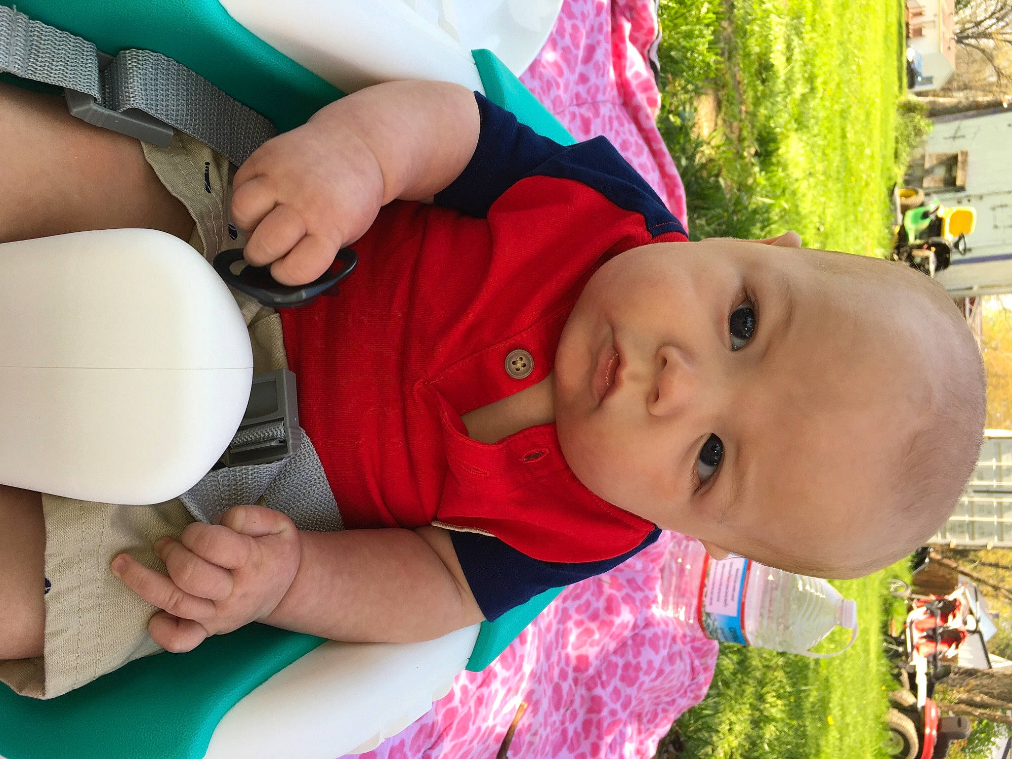 Austyn is registered to the contest to win money with this photo: baby, baby_toddler_clothing, child, fun, grass, green, hand, happy, hat, human, leisure, nail, person, plant, play, recreation, sitting, skin, toddler, tree