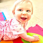 Cheyenne joined the competition — help win amazing prizes! baby, bright, child, childhood, clothing, colorful_mats, crawling, cute, floor, hand, happy, head, indoors, infant, person, pink_hearts, play_mat, portrait, skin, smiling