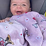 baby, smiling, blanket, pink, cartoon_characters, car_seat, child, happy, face, portrait, infant, cozy, comfort, cute, wrapped, clothing, head, toddler, seat, expression