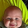 baby, infant, smile, face, chubby_cheeks, close_up, child, young, clothing, striped_shirt, yellow_background, happy, portrait, person, cute, skin, head, eyes, mouth, expression