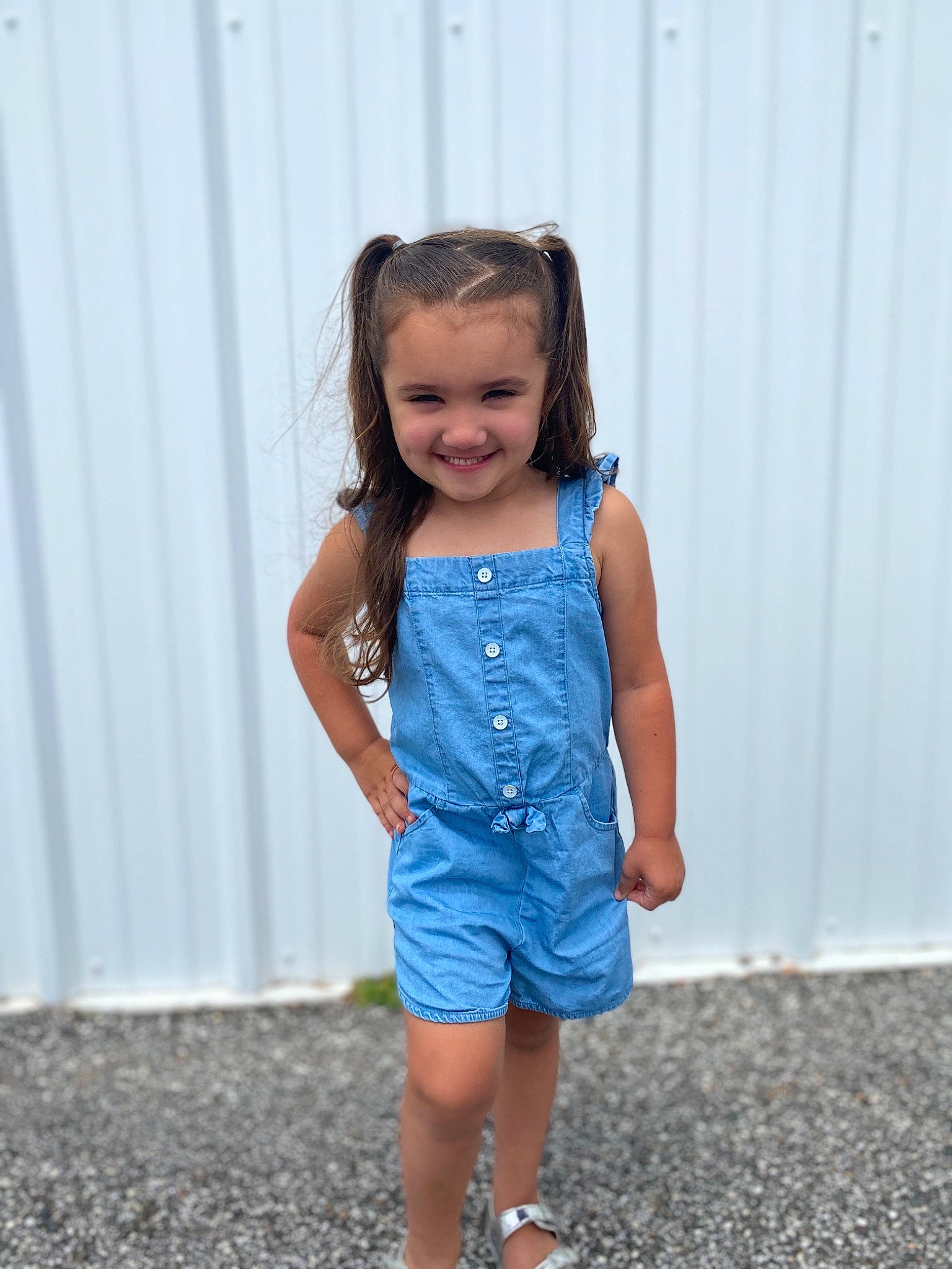 Ava-lee is registered to the contest to win money with this photo: blue, child, clothing, denim, dress, joy, overall, pattern, person, shorts, sleeveless_shirt, smile, standing, summer, t_shirt, toddler, vacation