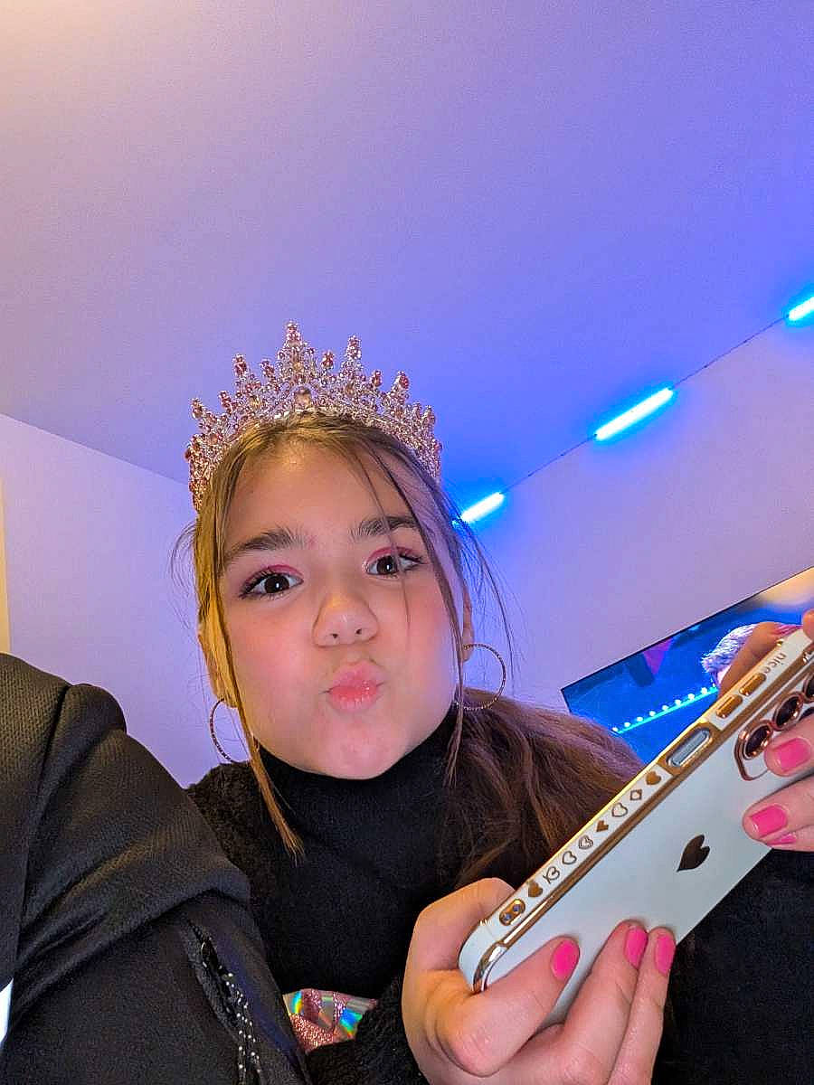 accessories, child, crown, electronics, face, female, girl, hair, head, jewelry, lady, mobilephone, musicalinstrument, necklace, person, phone, photography, portrait, selfie, tiara