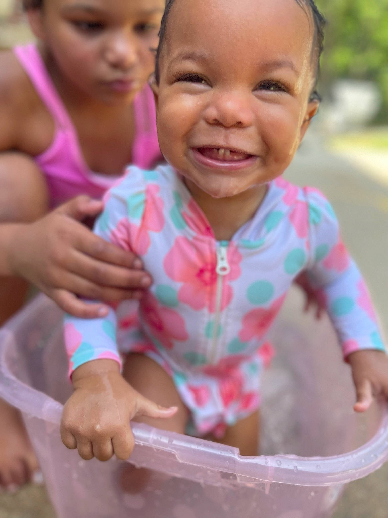 Luna is registered to the contest to win money with this photo: cheek, child, eye, face, facial_expression, finger, fun, gesture, hand, happy, head, headwear, joy, lip, mouth, nose, organ, person, photograph, pink