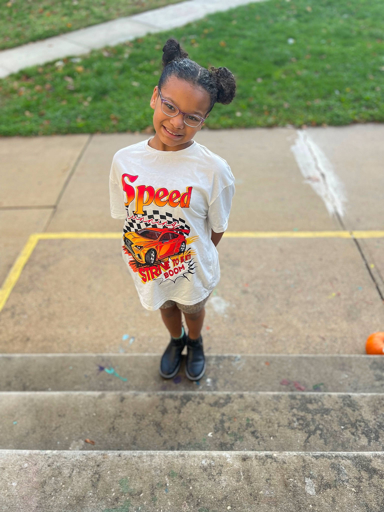 Brianna joined the competition — help win amazing prizes! asphalt, child, competition_event, concrete, eyewear, fun, happy, joy, leisure, pedestrian, person, play, recreation, road, road_surface, sidewalk, sleeve, street, sunglasses, t_shirt