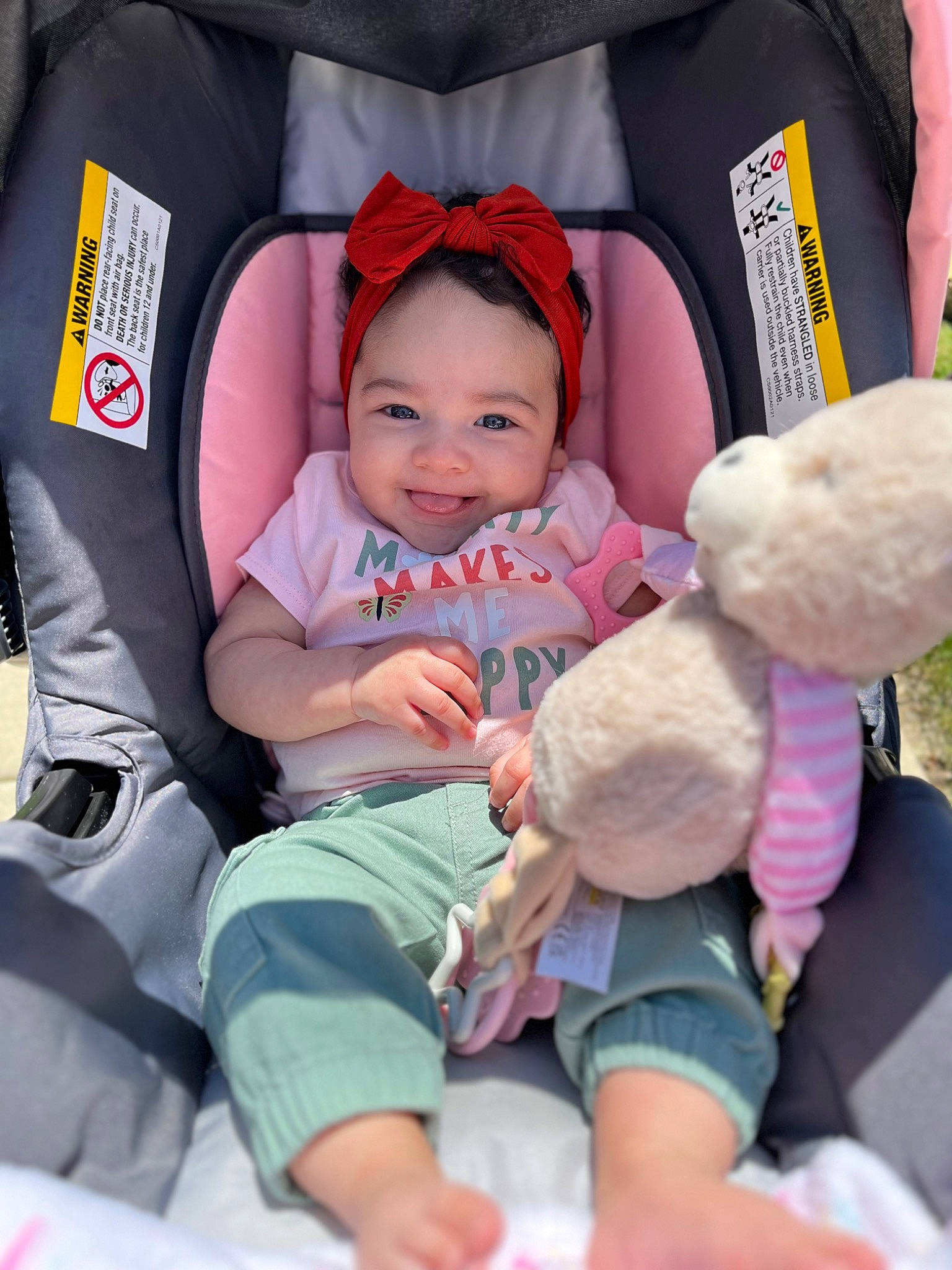 Nariyah is registered to the contest to win money with this photo: baby, baby_carriage, baby_products, baby_toddler_clothing, car_seat, cheek, comfort, finger, fun, happy, joy, lap, person, photograph, pink, product, skin, smile, toddler, toy