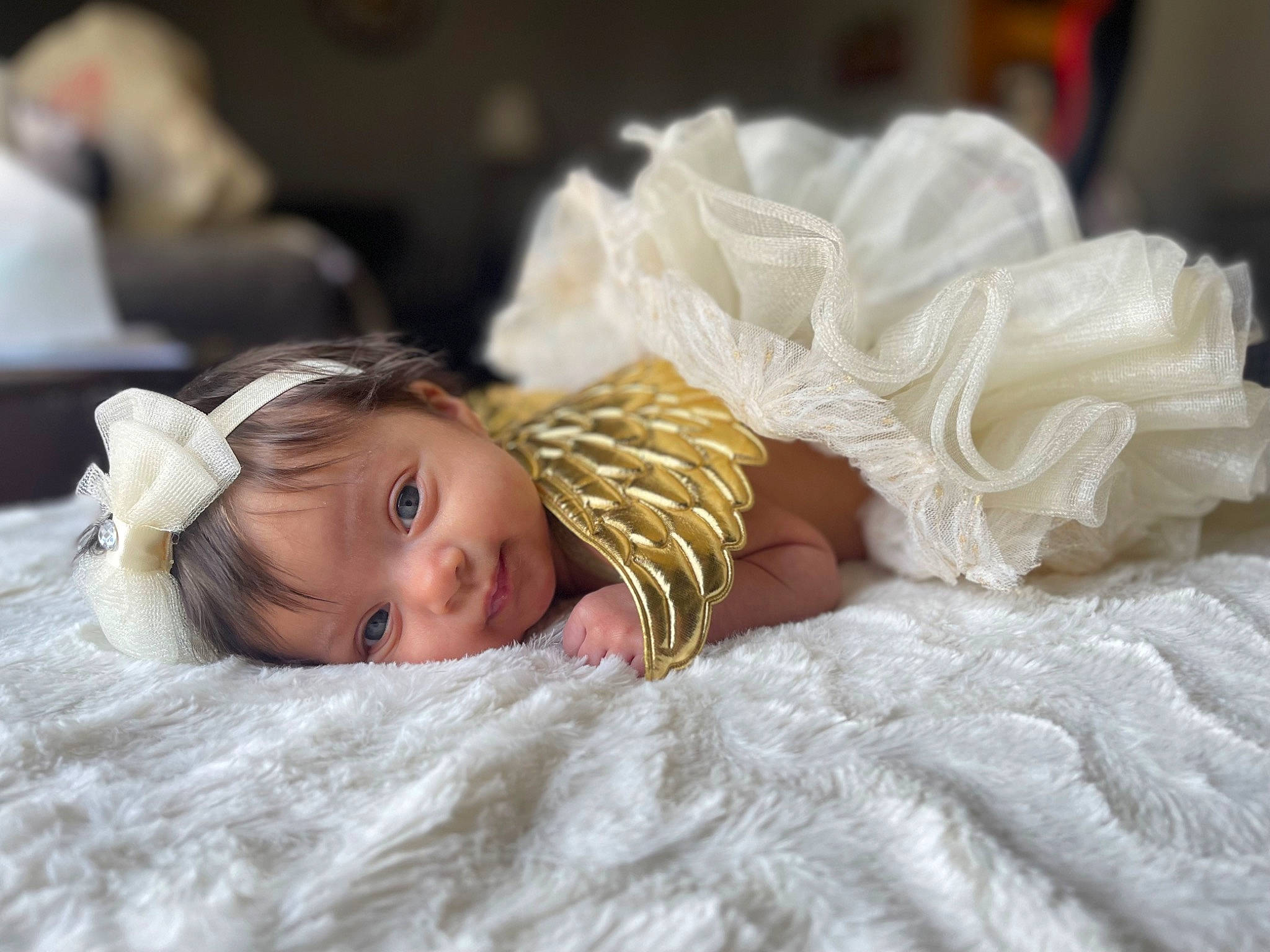 Brynleigh is registered to the contest to win money with this photo: bed, bed_sheet, bedding, bedtime, blond, child, comfort, couch, eye, flooring, fur, happy, hat, linens, nap, person, sitting, smile, toddler, toy