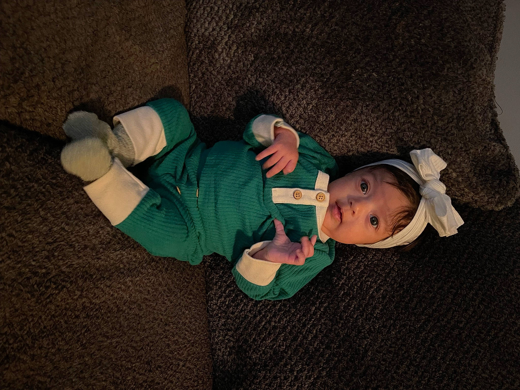 Brynleigh is registered to the contest to win money with this photo: baby, baby_toddler_clothing, child, comfort, hat, head, headwear, human_body, human_leg, knee, lap, linens, mammal, person, room, sitting, skin, sleeve, sock, thigh