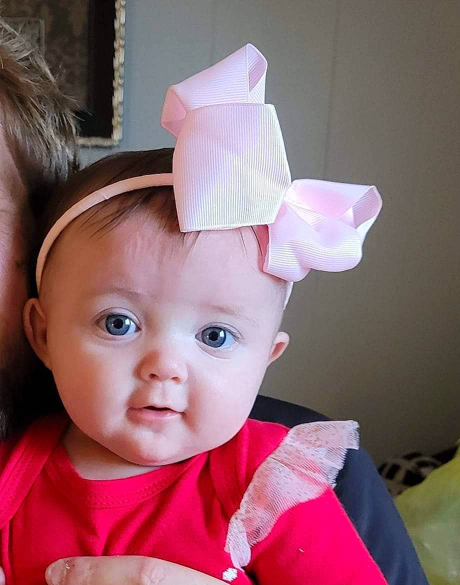 Kyrah is registered to the contest to win money with this photo: baby, baby_toddler_clothing, cheek, child, costume, costume_hat, ear, event, eyelash, fashion_accessory, fun, hair_accessory, happy, hat, headpiece, magenta, party_supply, peach, person, pink