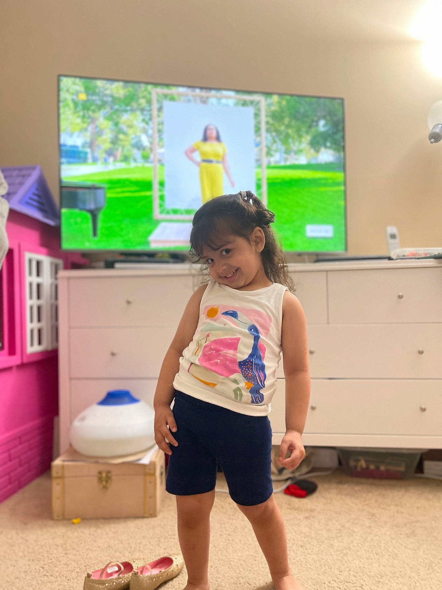 Sabrina joined the competition — help win amazing prizes! cabinetry, child, event, flooring, fun, happy, human_leg, joy, knee, leisure, mammal, person, play, room, shorts, snapshot, standing, t_shirt, television, thigh