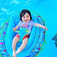 Dashiell joined the competition — help win amazing prizes! baby, blue, child, cute, float, fun, happy, infant, inflatable, outdoor, person, playful, pool, safety, smiling, summer, swimming, swimwear, vacation, water