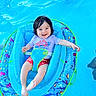 baby, blue, child, cute, float, fun, happy, infant, inflatable, outdoor, person, playful, pool, safety, smiling, summer, swimming, swimwear, vacation, water