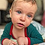 Dayann participe au concours pour gagner de l'argent avec cette photo : baby, child, blue_eyes, close_up, cute, infant, laying, soft_toys, indoors, portrait, curious, clothing, hand, face, skin, young, person, expression, background_blur, cozy