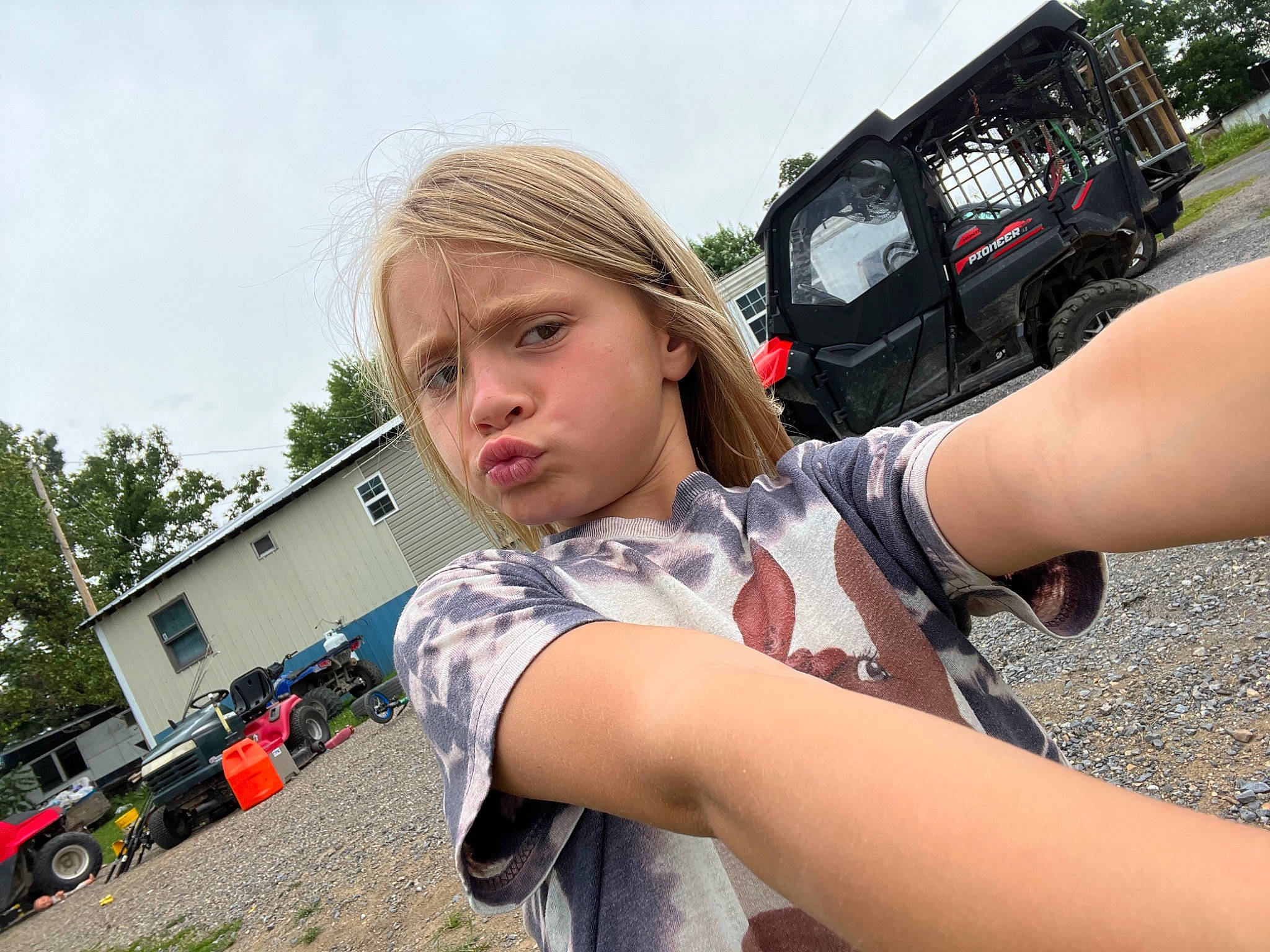 Kristlynn joined the competition — help win amazing prizes! asphalt, automotive_design, automotive_exterior, automotive_lighting, automotive_tire, bumper, eyewear, gesture, grass, happy, hat, hood, landscape, leisure, motor_vehicle, person, sky, sorrow, travel, tree