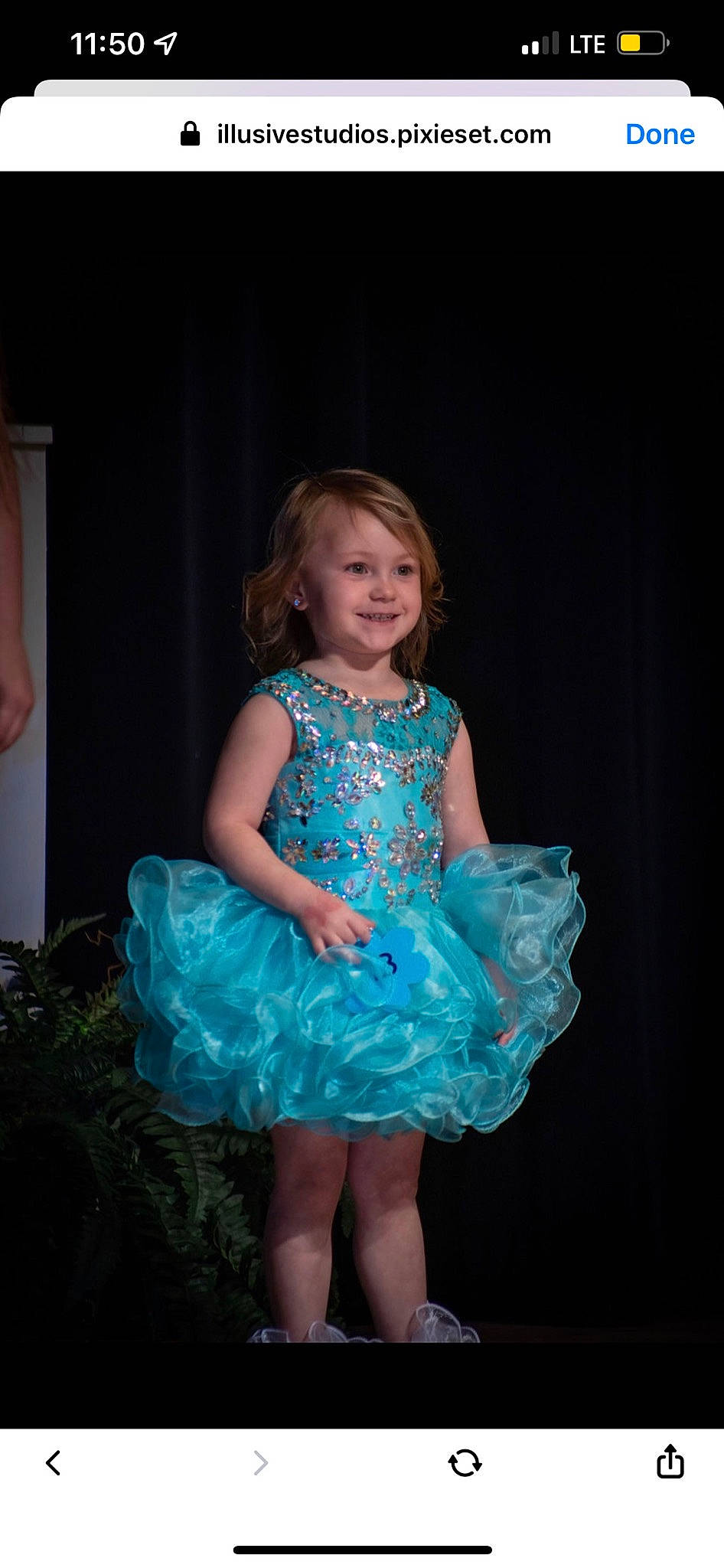 Kaelynn is registered to the contest to win money with this photo: baby_toddler_clothing, child, day_dress, dress, electric_blue, embellishment, event, fashion_design, flash_photography, formal_wear, fun, happy, human_leg, iris, joy, long_hair, one_piece_garment, person, pink, smile