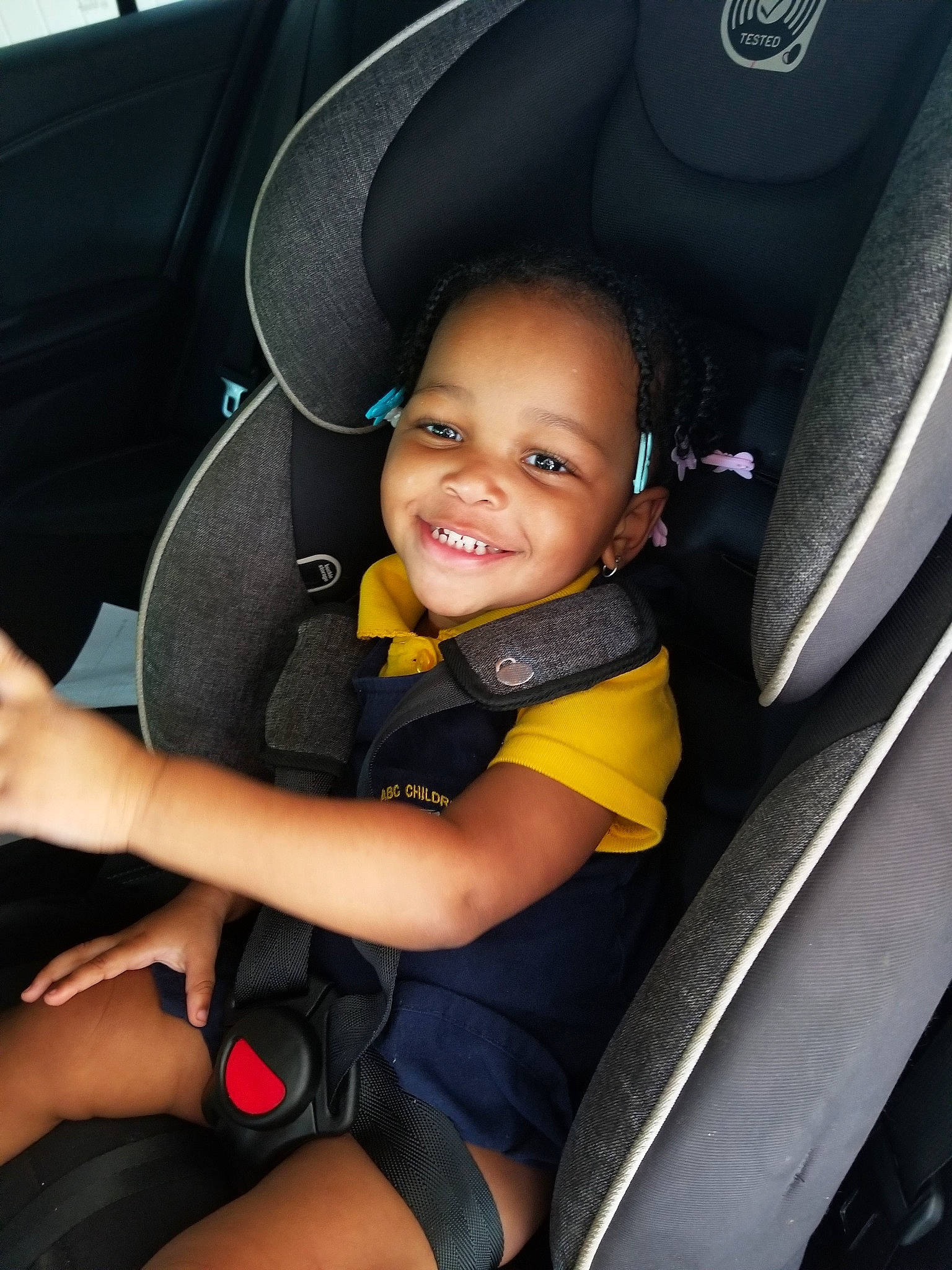 Rhiley joined the competition — help win amazing prizes! auto_part, automotive_design, car, car_seat, car_seat_cover, child, driving, family_car, fun, girl, joy, person, product, seat_belt, sitting, smile, steering_part, vehicle, vehicle_door