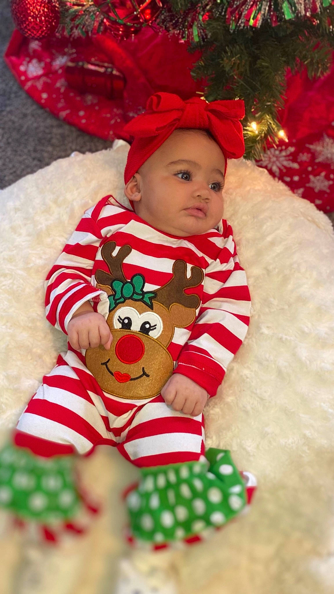 Azara is registered to the contest to win money with this photo: baby, baby_products, baby_toddler_clothing, baby_toys, carmine, child, christmas, christmas_eve, costume, costume_accessory, costume_hat, fictional_character, holiday, human, human_body, person, plush, polka_dot, red, toddler