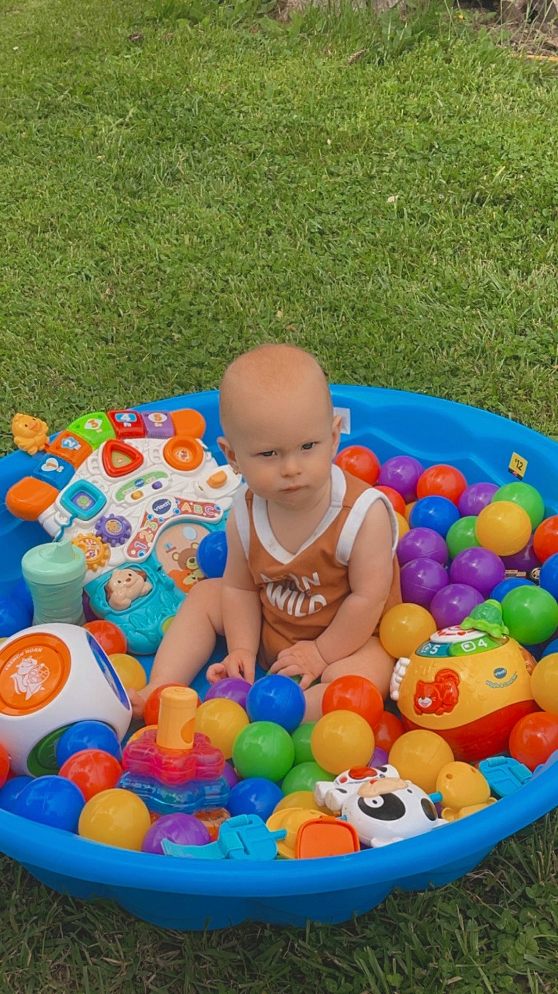 Everest is registered to the contest to win money with this photo: baby, baby_playing_with_toys, baby_products, baby_toys, ball, ball_pit, child, easter, event, fun, games, grass, leisure, person, plastic, play, product, recreation, sports_toy, toddler