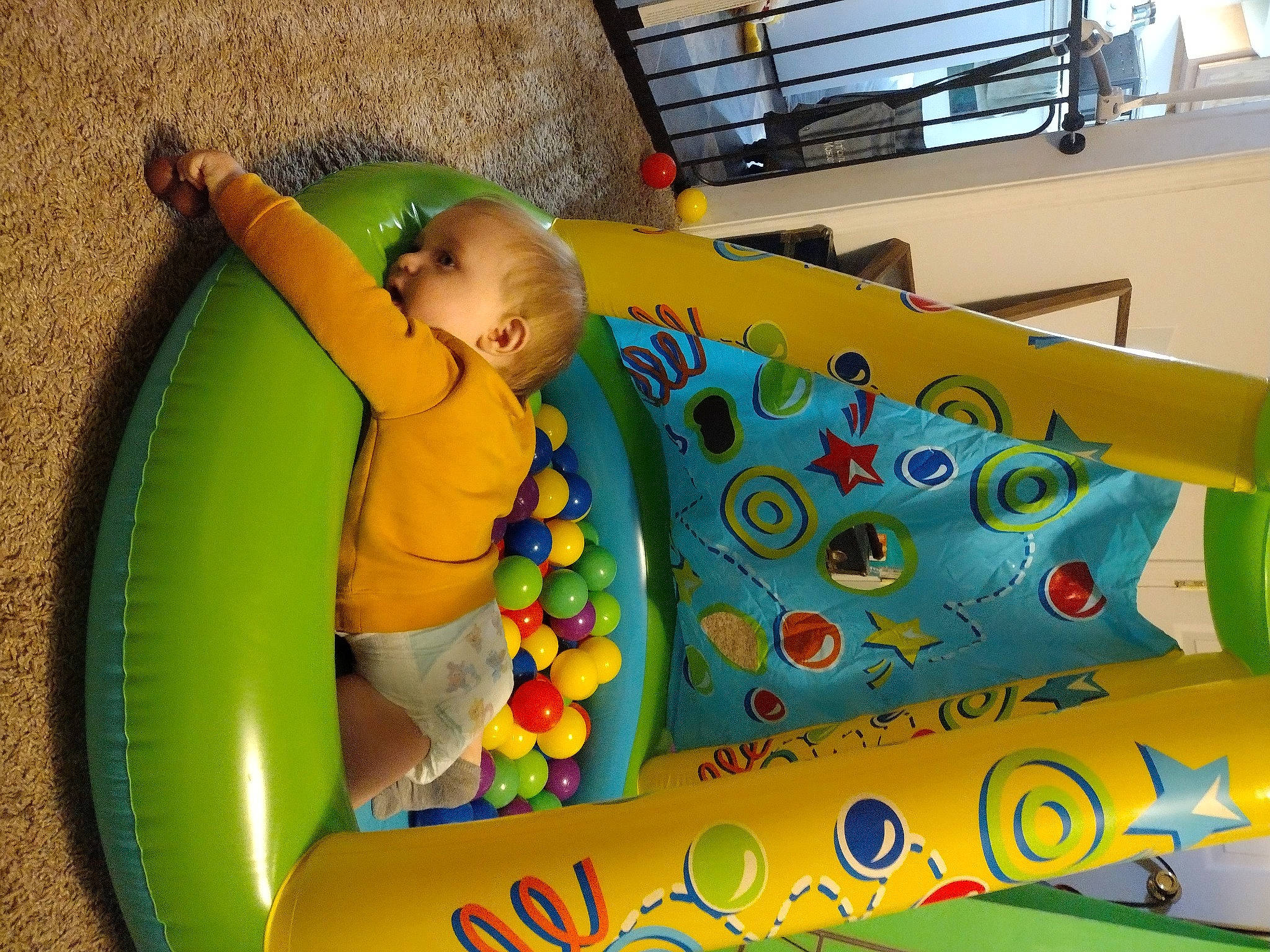 Ameri is registered to the contest to win money with this photo: art, baby, baby_products, baby_toys, child, circle, comfort, fun, inflatable, leisure, pattern, person, play, recreation, room, toddler, toy, window