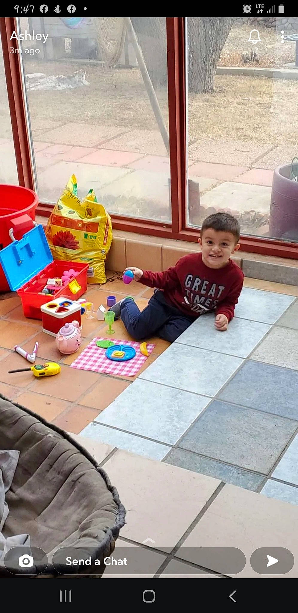 Andres joined the competition — help win amazing prizes! bag, box, child, floor, flooring, fun, joy, leisure, person, plastic, play, recreation, room, sitting, smile, stuffed_toy, t_shirt, toddler, toy, vacation