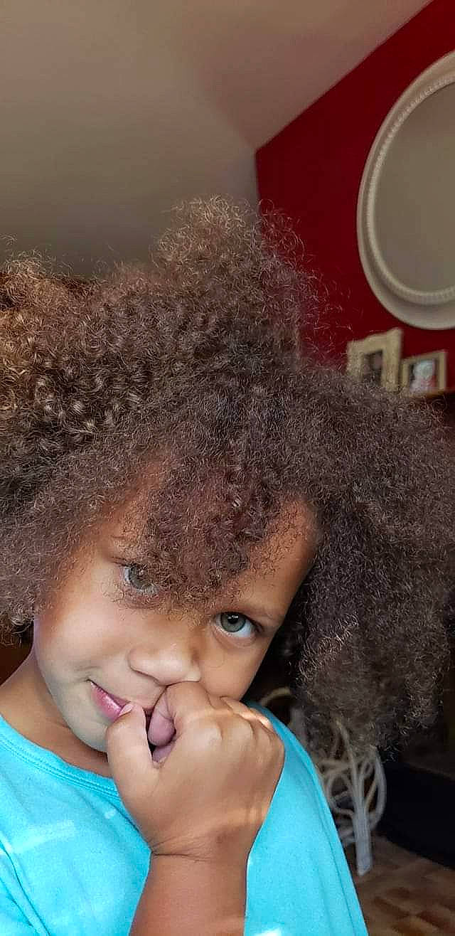 Neveah is registered to the contest to win money with this photo: afro, black_hair, blue, cap, cheek, cool, eyebrow, eyelash, fashion_accessory, flash_photography, fun, fur, happy, jheri_curl, lip, nose, person, ringlet, skin, smile