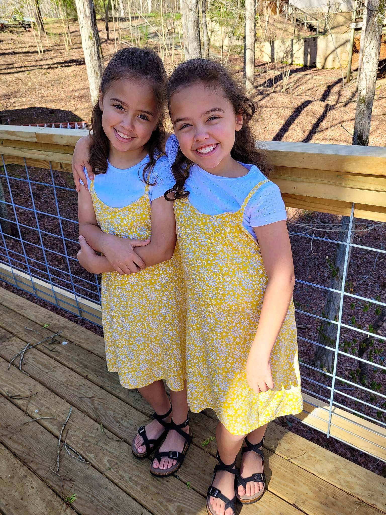 Haile is registered to the contest to win money with this photo: child, event, face, formal_wear, fun, grass, happy, head, human_leg, joy, leisure, people_in_nature, person, plant, recreation, sandal, skin, smile, standing, travel