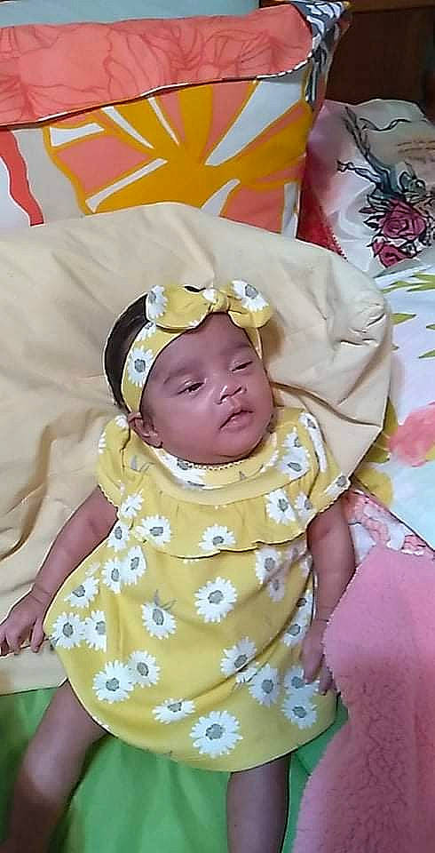 Angel is registered to the contest to win money with this photo: baby, baby_products, baby_safety, baby_sleeping, baby_toddler_clothing, cheek, child, comfort, event, facial_expression, fun, happy, head, headgear, headwear, linens, pattern, person, room, sleeve