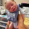 Markus joined the competition — help win amazing prizes! arm, baby, bib, casual, clothing, cute, drawer, expression, fabric, furniture, hand, happy, holding, indoor, infant, newborn, person, room, skin, smiling