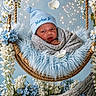 Markus is registered to the contest to win money with this photo: baby, blue, blue_hat, cozy, cute, decorative, face, flowers, fluffy, infant, knit_blanket, nature, newborn, peaceful, portrait, soft, sparkles, swing, white, wrapped