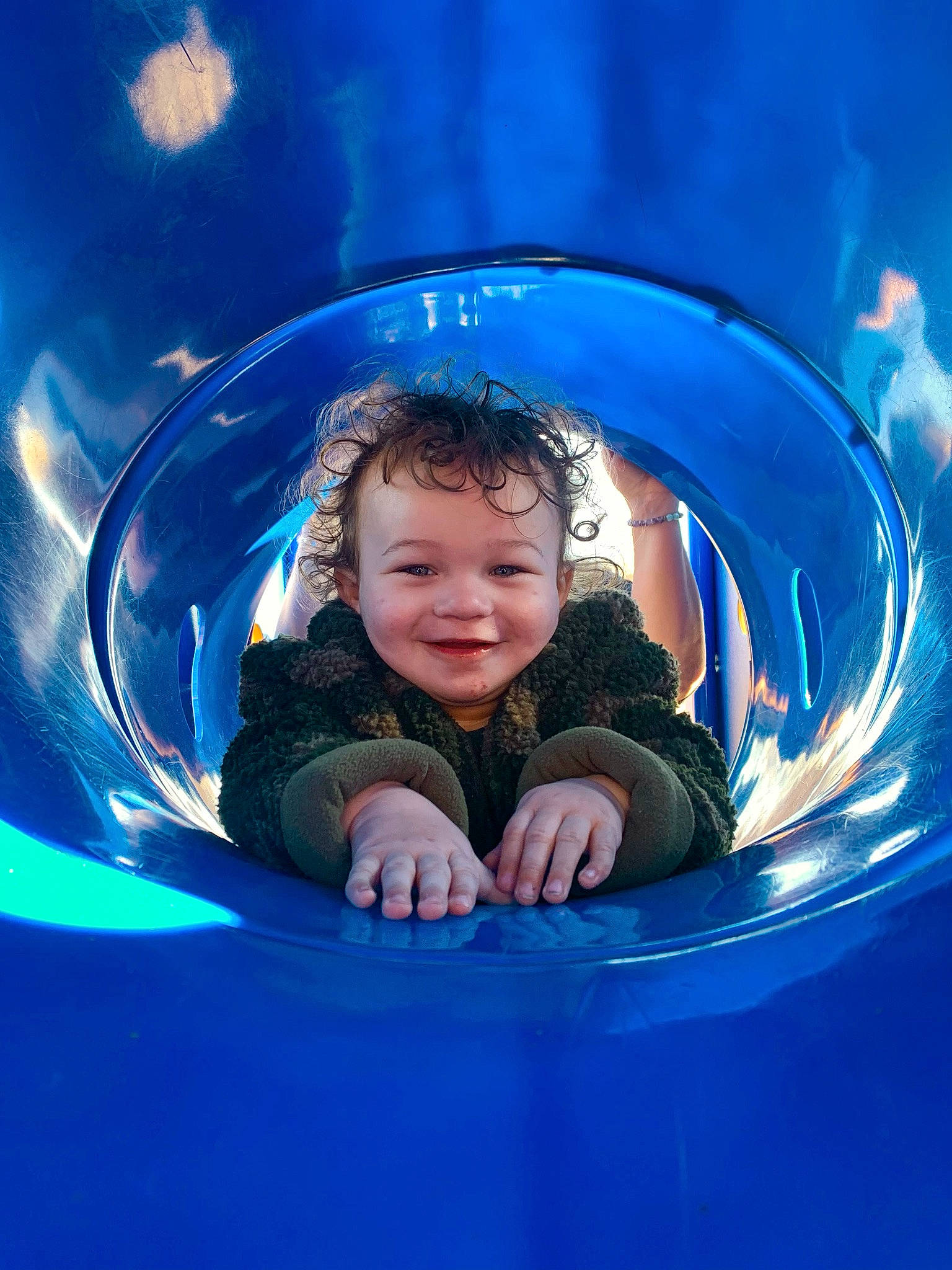 Jaxin is registered to the contest to win money with this photo: azure, blue, child, circle, electric_blue, flash_photography, fun, gesture, happy, inflatable, joy, leisure, mouth, person, playground, recreation, reflection, smile, space, symmetry