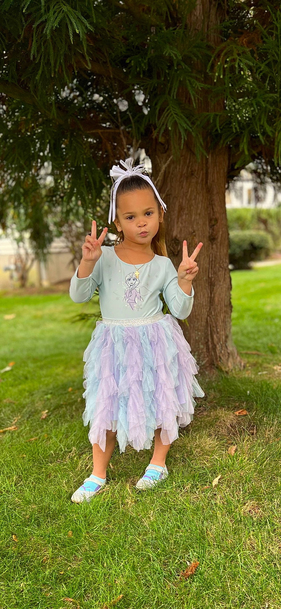 Valencia joined the competition — help win amazing prizes! baby, baby_toddler_clothing, day_dress, face, gesture, grass, grassland, happy, head, leaf, magenta, one_piece_garment, people_in_nature, person, pink, plant, shoulder, sleeve, toddler, tree