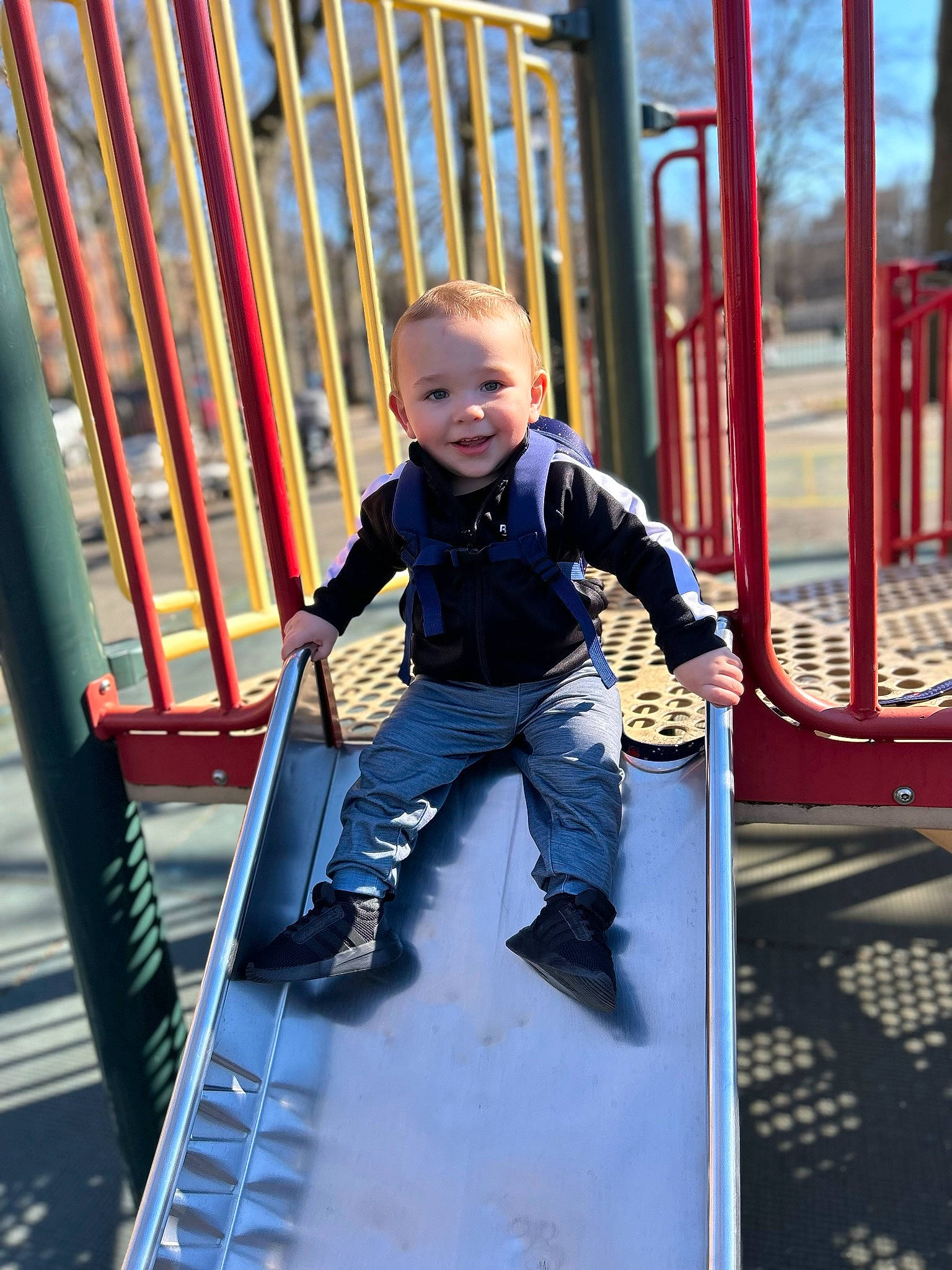 Michael joined the competition — help win amazing prizes! baby, baby_toddler_clothing, child, city, denim, electric_blue, fun, handrail, happy, joy, leisure, outdoor_play_equipment, person, play, playground, recreation, sitting, smile, stairs, t_shirt