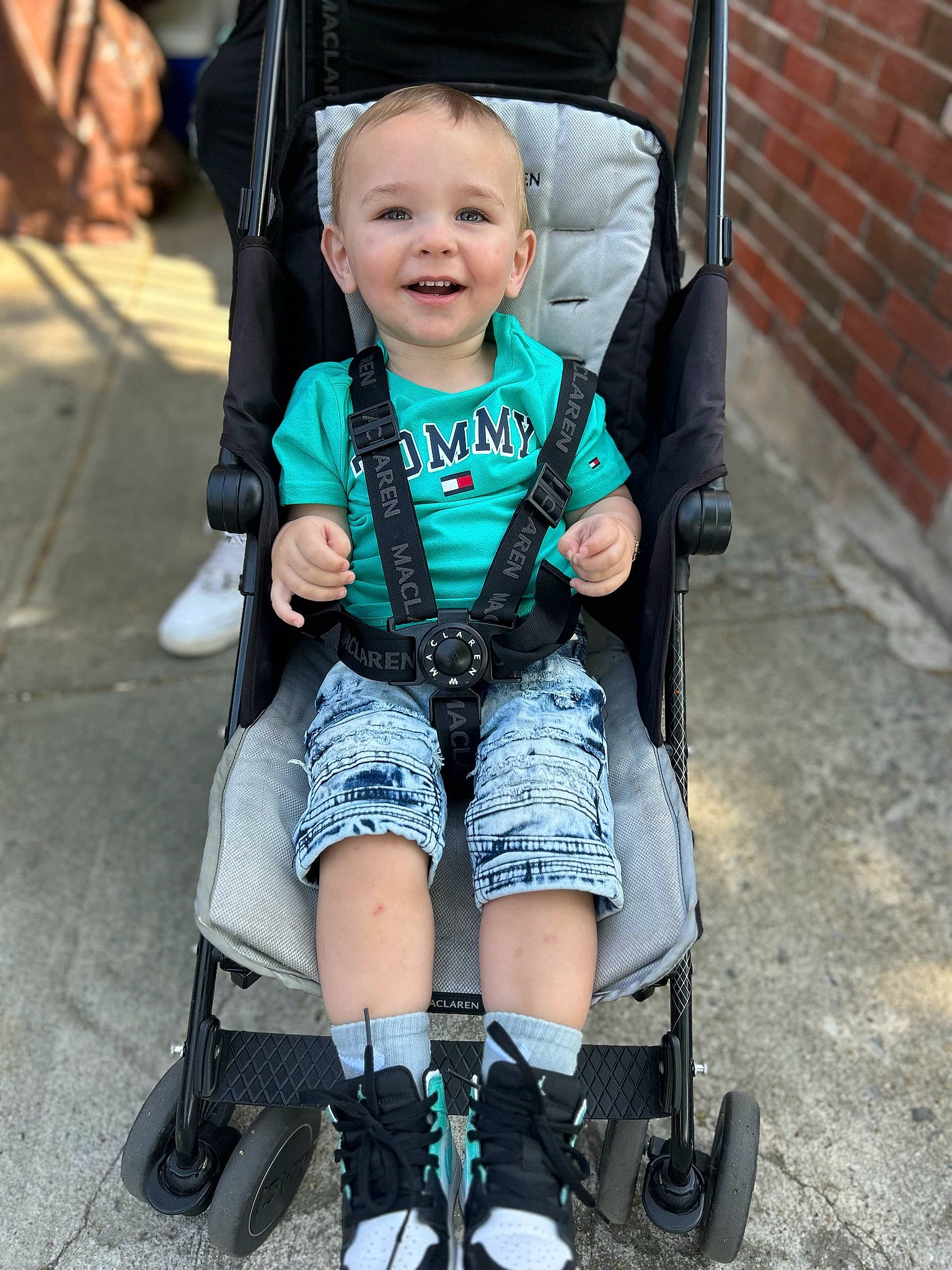 Michael is registered to the contest to win money with this photo: baby, baby_carriage, baby_toddler_clothing, beauty, black, child, face, fun, green, joy, knee, person, photograph, product, rolling, smile, snapshot, style, tire, toddler