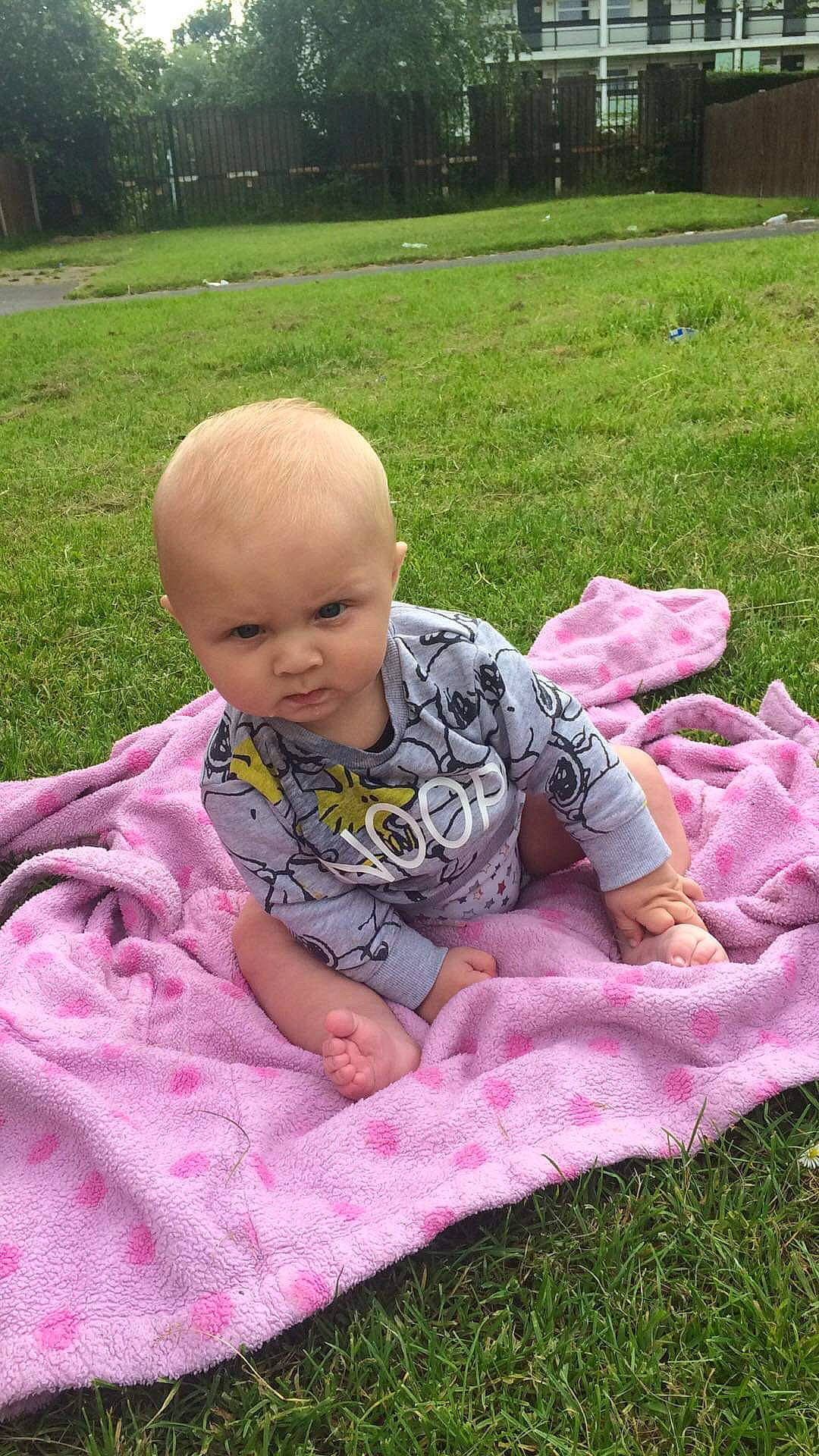 Denzel joined the competition — help win amazing prizes! baby, child, grass, lawn, person, pink, play, toddler